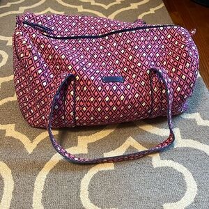 Pink and navy duffle bag